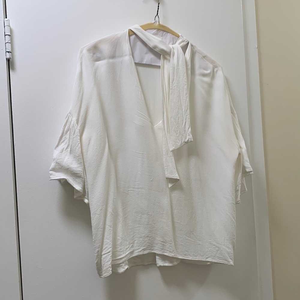 White flutter blouse from Zara